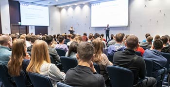 Lecture hall filled with management trainees